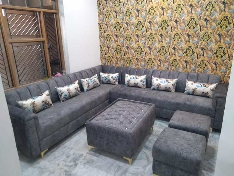 Custom 10-seater L-shaped sofa set with ottomans built for a Coimbatore home