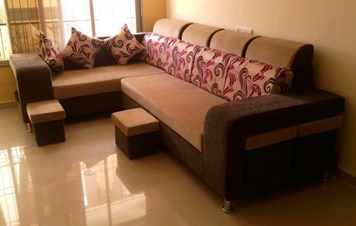 Living room sofa set with matching side units in a Coimbatore residence