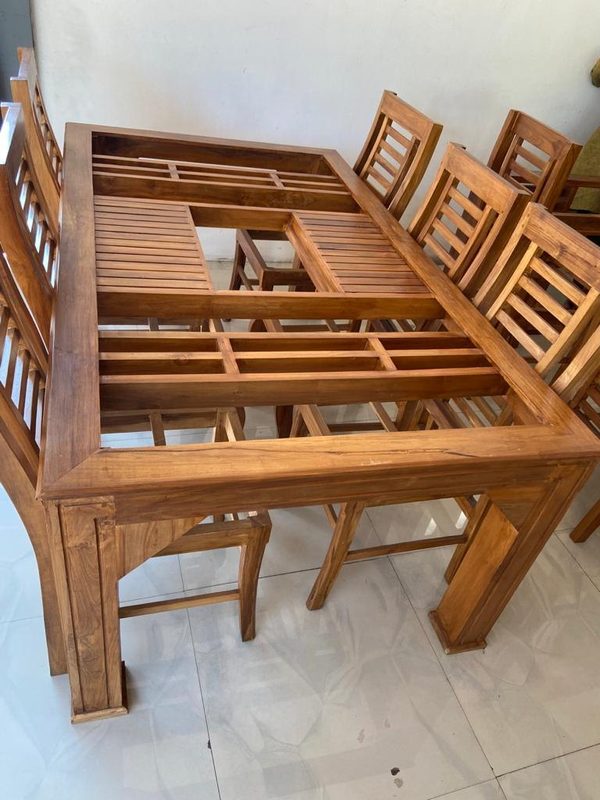 Solid teak dining table and chairs handcrafted in Coimbatore