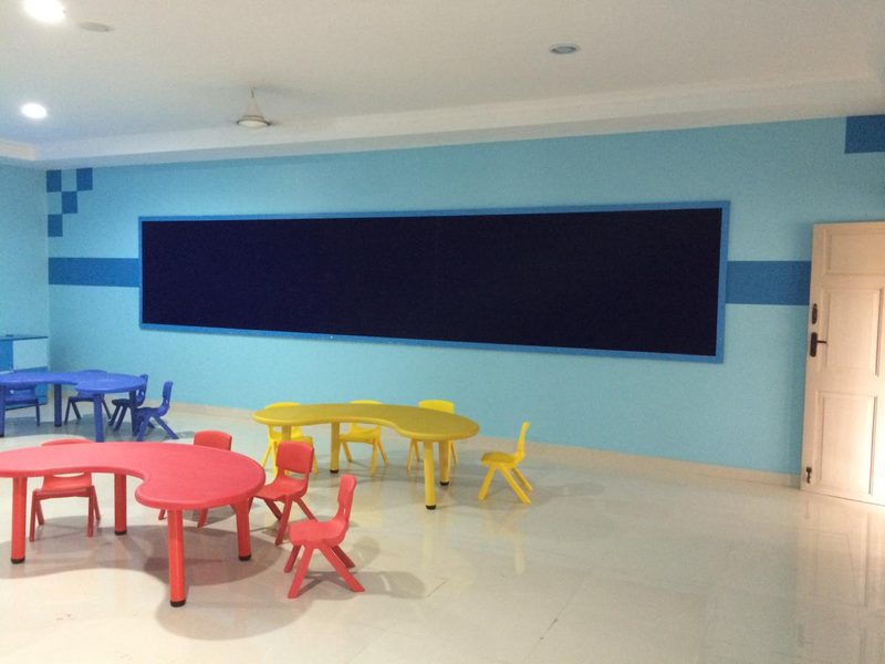 Kindergarten classroom furnished with child-height tables and chairs in Coimbatore