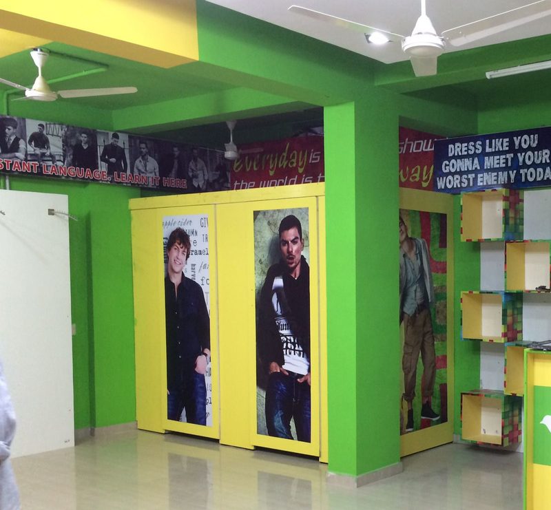 Retail shop partition with branded display panels in Coimbatore