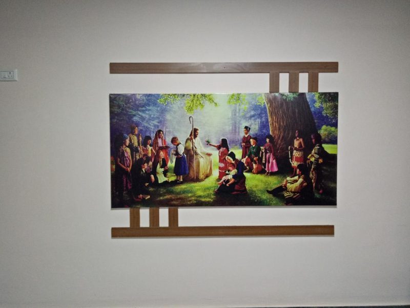Custom framed artwork panel mounted as a feature wall in Coimbatore