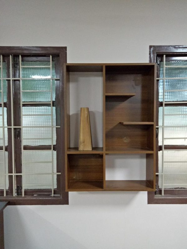 Wall-mounted wooden display shelving with glass sections in Coimbatore