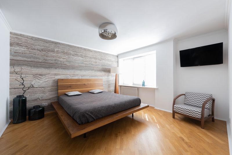 Luxury master bedroom interior with customized wardrobe in Coimbatore