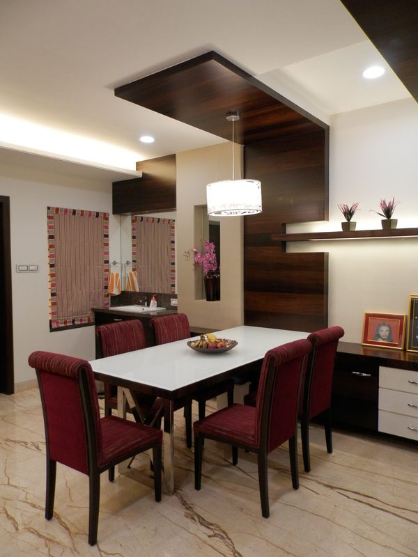 Elegant dining room interior setup with customized table in Coimbatore