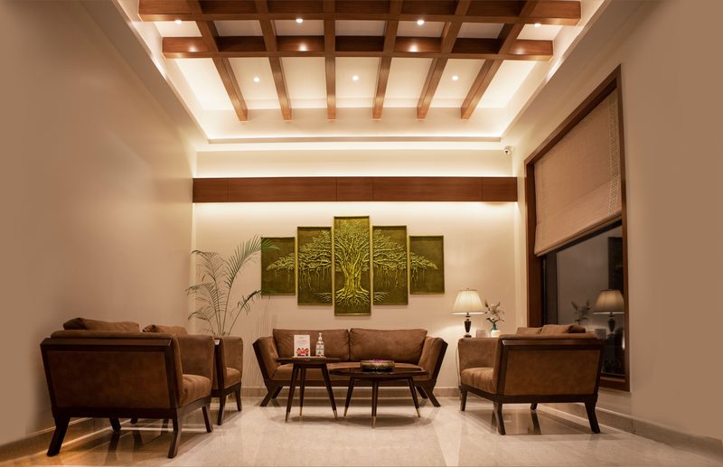 Contemporary living room interior design with modern TV unit in Coimbatore
