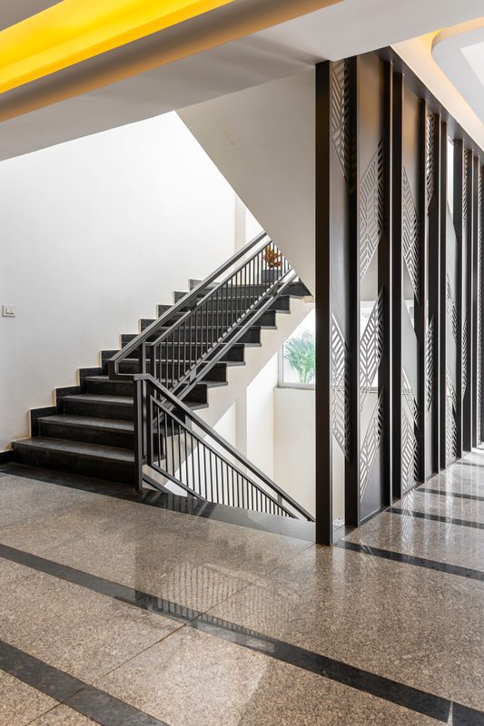 Stainless steel indoor staircase railing installation in a Coimbatore home