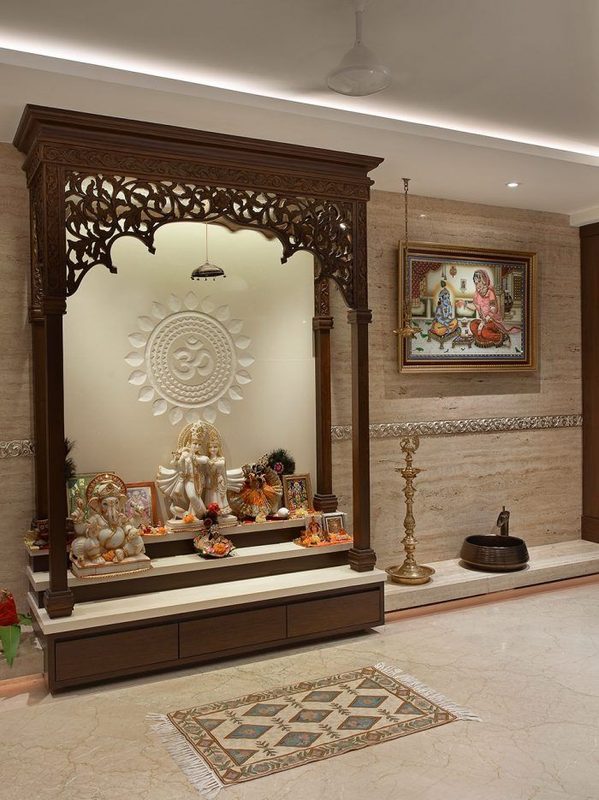 Traditional wooden pooja room interior design crafted for a Coimbatore residence